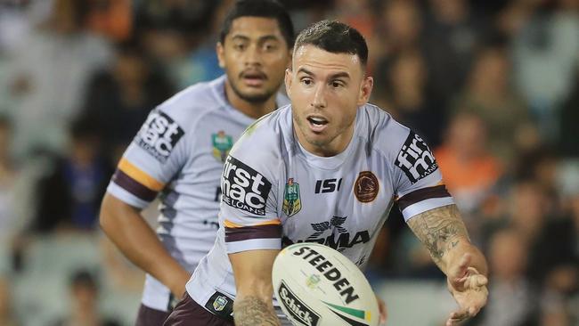 Darius Boyd of the Broncos runs with the ball.