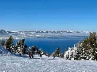 Skiers enjoy great views of Lake Tahoe.