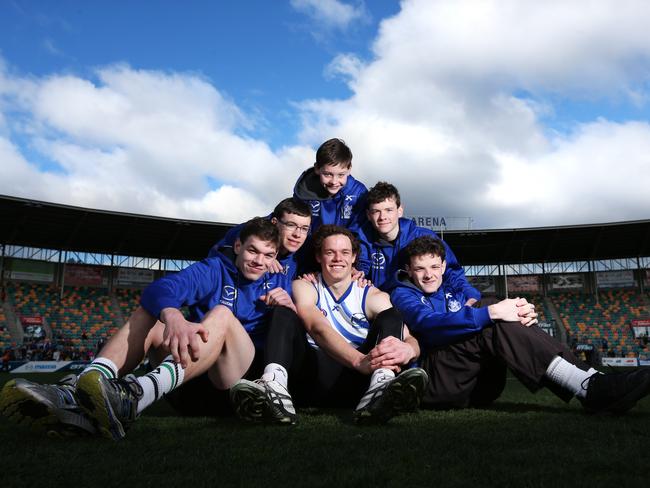 Brown with brothers (L-R) Cameron (18), James (16), Ben, Luke (10), Dominic (14) and Alex (20) at Blundstone Arena.