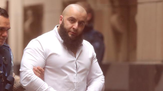 The court was closed shortly after the verdict was returned as one of the trio, Hatim Moukhaiber said “you are dogs” to the jury. Picture: The Australian.