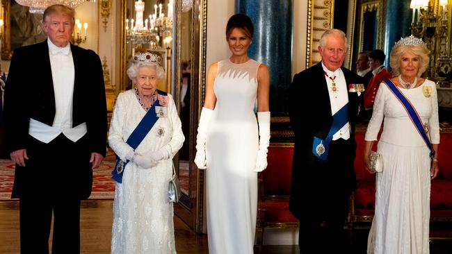 Britain's Queen Elizabeth II, US President Donald Trump, US First Lady Melania Trump, Britain's Prince Charles, Prince of Wales and Britain's Camilla, Duchess of Cornwall pose for a photograph ahead of a State Banquet in the ballroom at Buckingham Palace in central London