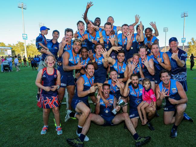 Rovers celebrate their 15-point win over Pioneer in the grand final, becoming only the third side in the 73-year history of the CAFL to win four consecutive flags. Picture: Charlie Lowson