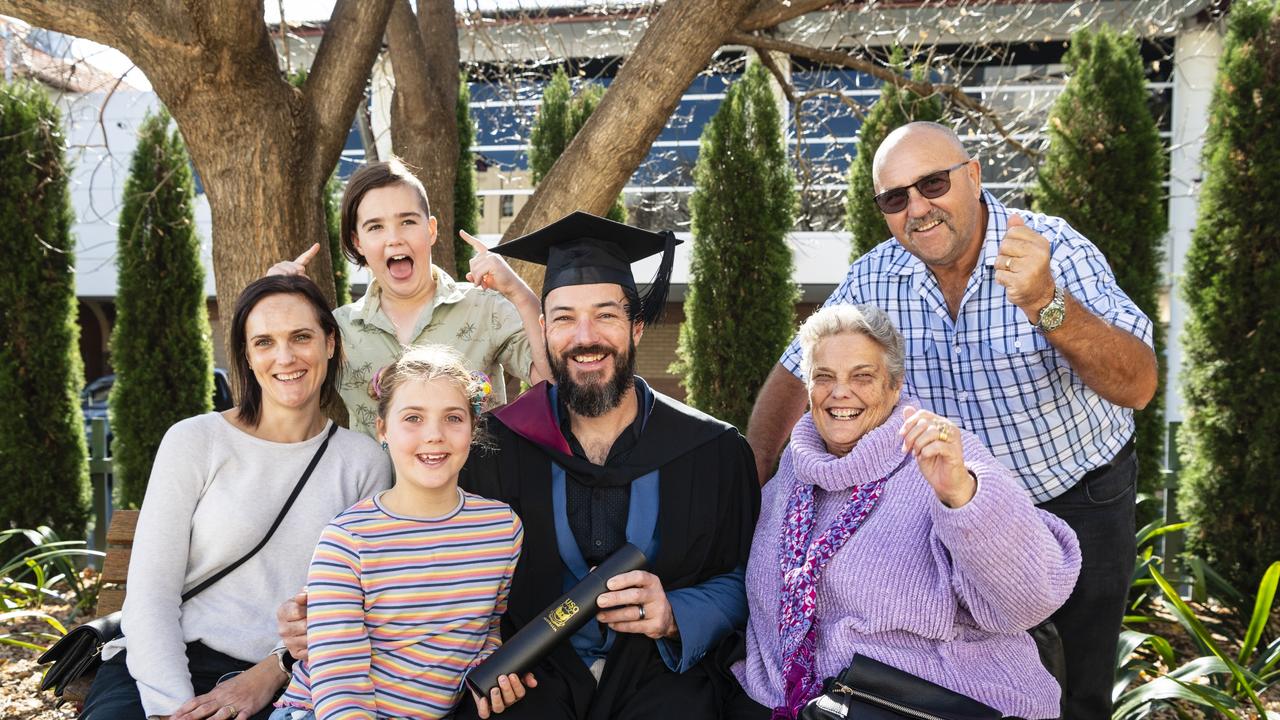 Bachelor of Engineering Science graduate Tim Parfitt with family (from left) Lisa, Abby and Conor Parfitt and Chris and Geoff Davidson at a UniSQ graduation ceremony at Empire Theatres, Wednesday, June 28, 2023. Picture: Kevin Farmer