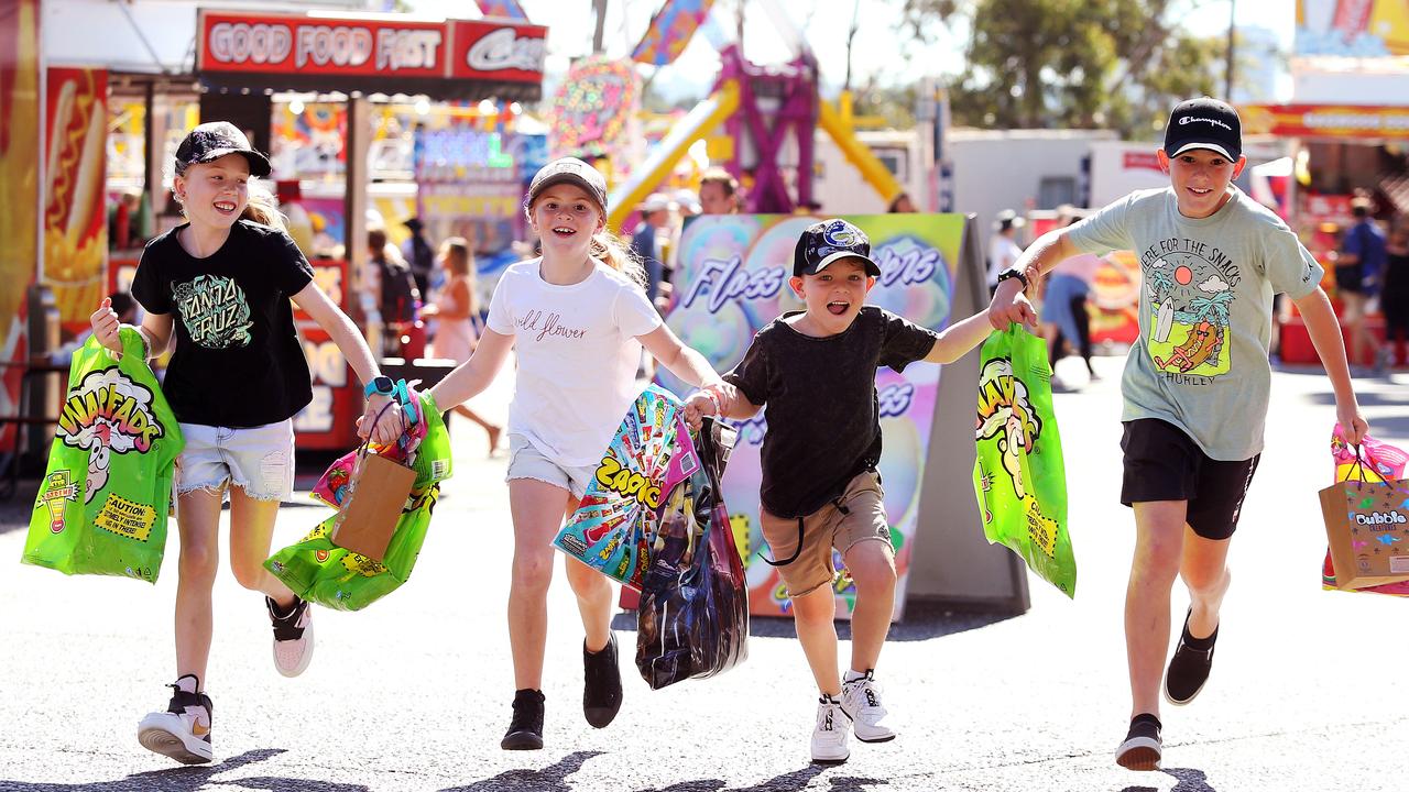 Pictured having fun at the Sydney Royal Easter Show today is Arnika Matvejev 9, Sienna Arnet 8, Nate Matvejev 6 and Cameron Arnet 10. Picture: Tim Hunter.