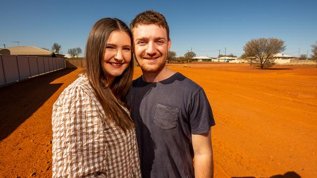 Tom Hennessy and Tessa McDougall at the block of land they have purchased in Quilpie. Picture: Leon O'Neil