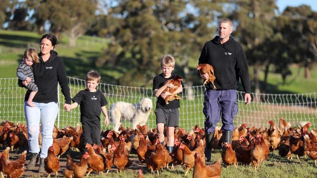 WesEggs are free range egg producers who fear invasion by vegan activists. The family is Wes and Mandy Humpage with their children Ted, 9, Mack, 6, and Kip, 1. Picture: Alex Coppel