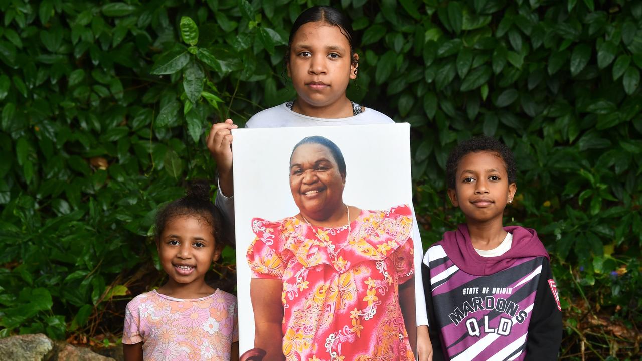 Unique, 5, Missy, 12, and Isaias, 8, with a image their grandmother Emma 'Alli' Sailor. Picture: Evan Morgan