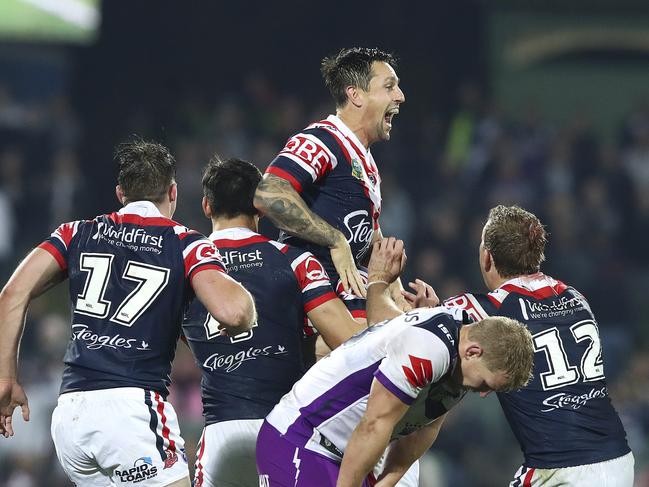 NRL - Sydney Roosters v Melbourne Storm - Adelaide Oval. Roosters win in extra time. Mitchell Pearce (centre highest)  Picture Sarah Reed