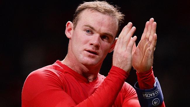 Wayne Rooney calls for calm at Manchester United.