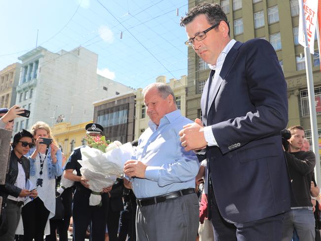 Premier Daniel Andrews and Lord Mayor Robert Doyle pay their respects. Picture: Alex Coppel.