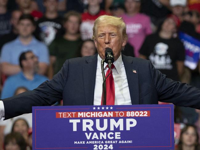 GRAND RAPIDS, MICHIGAN - JULY 20: Republican Presidential nominee former President Donald J. Trump holds his first public campaign rally with his running mate, Vice Presidential nominee U.S. Senator J.D. Vance (R-OH) (not pictured), at the Van Andel Arena on July 20, 2024 in Grand Rapids, Michigan. This is also Trump's first public rally since he was shot in the ear during an assassination attempt in Pennsylvania on July 13. Photo by Bill Pugliano/Getty Images) (Photo by BILL PUGLIANO / GETTY IMAGES NORTH AMERICA / Getty Images via AFP)