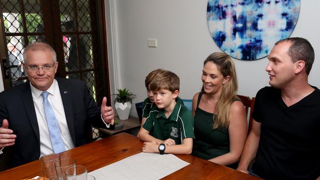 Prime Minister Scott Morrison chats with Leearna Gibbs, partner Jeremy Neal and kids Taj Rotherhman and his brother Kai.