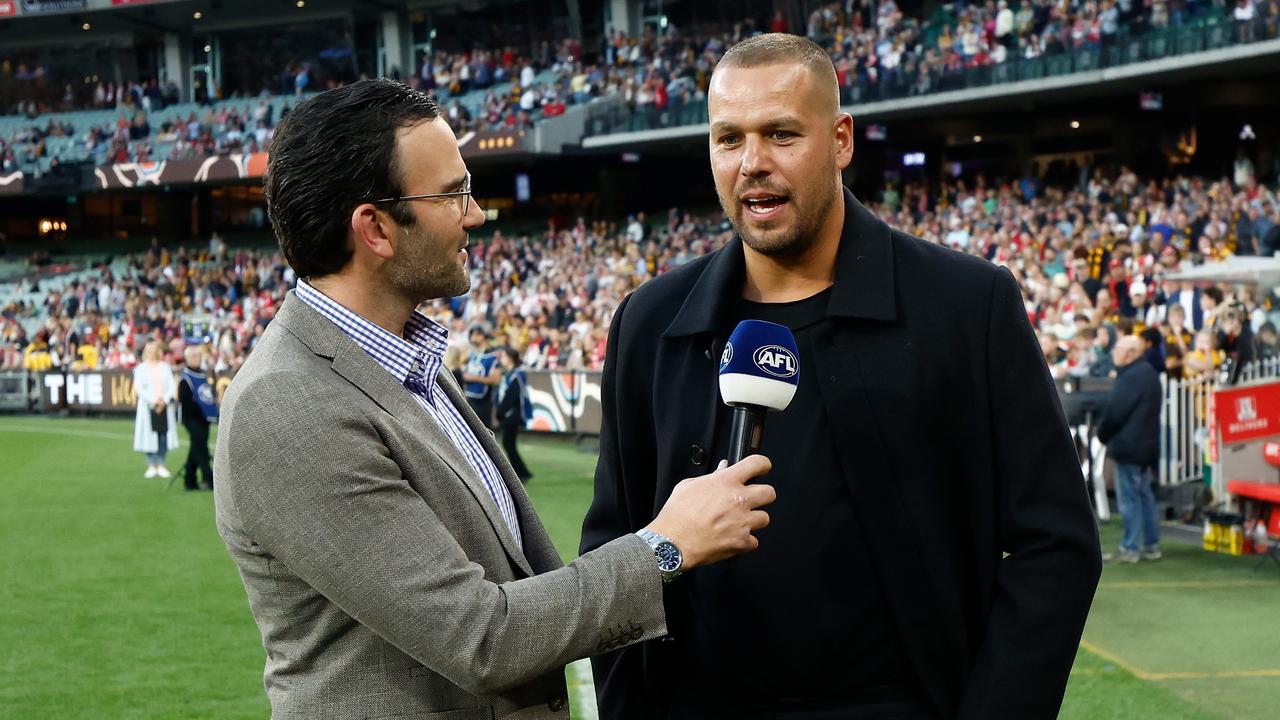 Franklin speaks with Jordan Lewis as he was farewelled during the Round 7 match between the Hawks and Swans at the MCG. (Photo by Michael Willson/AFL Photos via Getty Images)