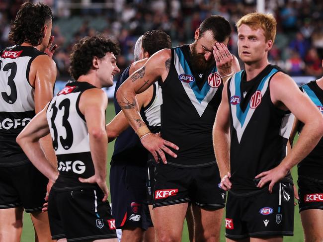 ADELAIDE, AUSTRALIA - MARCH 30: Charlie Dixon of the Power reacts after their loss during the 2024 AFL Round 03 match between the Port Adelaide Power and the Melbourne Demons at Adelaide Oval on March 30, 2024 in Adelaide, Australia. (Photo by James Elsby/AFL Photos via Getty Images)