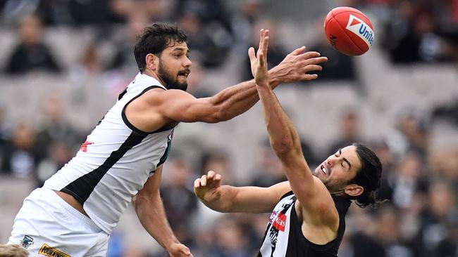 Paddy Ryder outpoints Collingwood’s Brodie Grundy in his 200th game, at the MCG. Picture: Julian Smith (AAP)