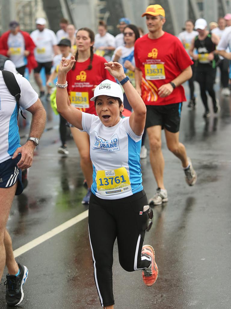 <p>Maria Cheung at the Sunday Mail Bridge to Brisbane fun Run, Sunday August 26, 2018. (AAP Image/Jono Searle)</p>