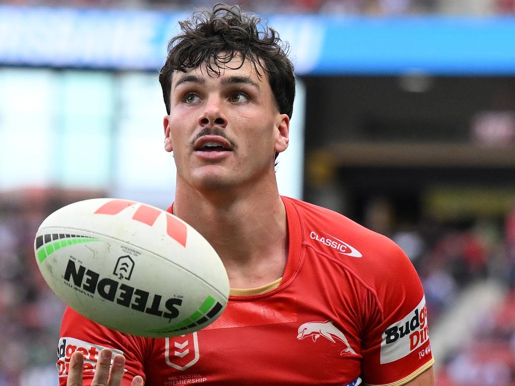 BRISBANE, AUSTRALIA - AUGUST 11: Herbie Farnworth of the Dolphins celebrates scoring a try during the round 23 NRL match between Dolphins and New Zealand Warriors at Suncorp Stadium, on August 11, 2024, in Brisbane, Australia. (Photo by Matt Roberts/Getty Images)