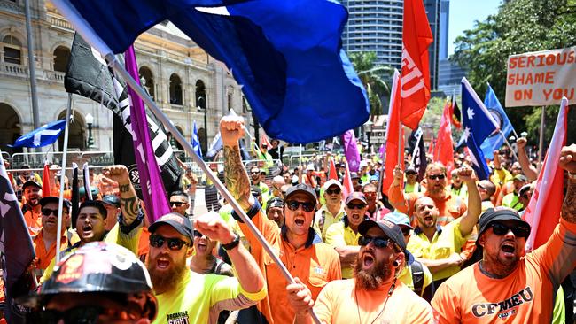 Construction workers take part in a CFMEU union rally outside Parliament House in Brisbane. Picture: Dan Peled