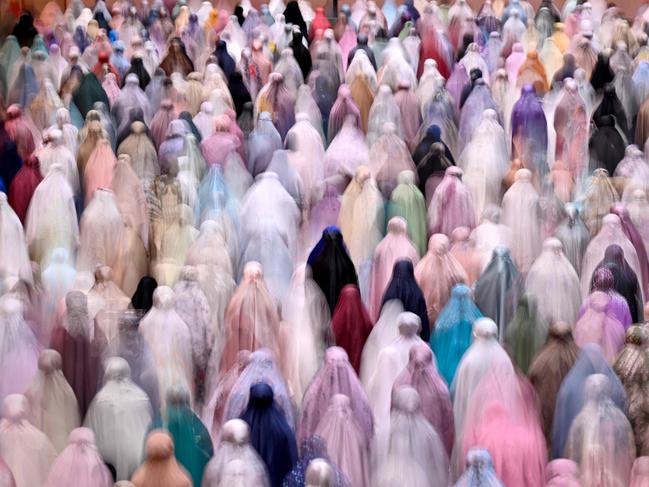 Muslim devotees offer night prayers in Jakarta, marking the start of Islam's holy fasting month of Ramadan. Picture: Adek Berry/AFP