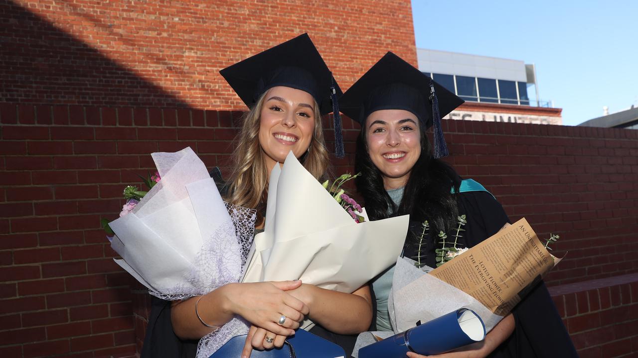 Graduates Salome Berry and Anamaria Cernic. Picture: Alan Barber