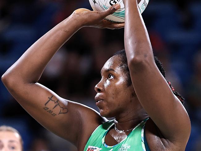 SYDNEY, AUSTRALIA - MARCH 23: Jhaniele Fowler-Nembhard  shoots during the 2024 Suncorp Team Girls Cup match between Queensland Firebirds and West Coast Fever at Ken Rosewall Arena on March 23, 2024 in Sydney, Australia. (Photo by Jenny Evans/Getty Images for Netball Australia)