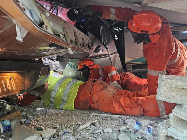 Rescue teams search under debris in Port Vila following a 7.3-magnitude earthquake in the southern Pacific nation of Vanuatu, in an image posted to social media on the 18th December, 2024. Picture: Vanuatu Police Force