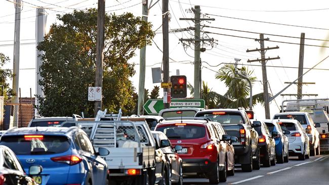 A photo of traffic at the intersection.