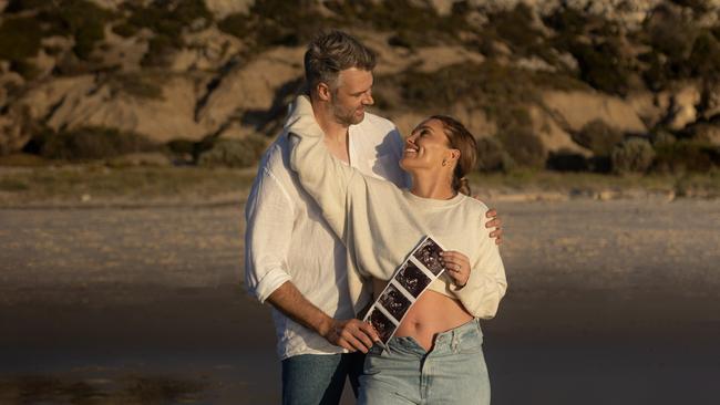 Abbey Holmes and Keegan Brooksby are expecting their first child. Picture: Diana Brandt