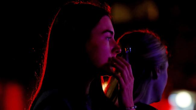 BONDI JUNCTION, AUSTRALIA - APRIL 13: Members of the public look on outside Westfield Bondi Junction on April 13, 2024 in Bondi Junction, Australia. Five victims, plus the offender, are confirmed dead following an incident at Westfield Shopping Centre in Bondi Junction, Sydney. (Photo by Lisa Maree Williams/Getty Images)