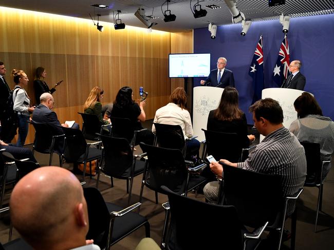 Prime Minister Scott Morrison (left) and Deputy Chief Medical Officer Professor Paul Kelly. Picture: Joel Carrett