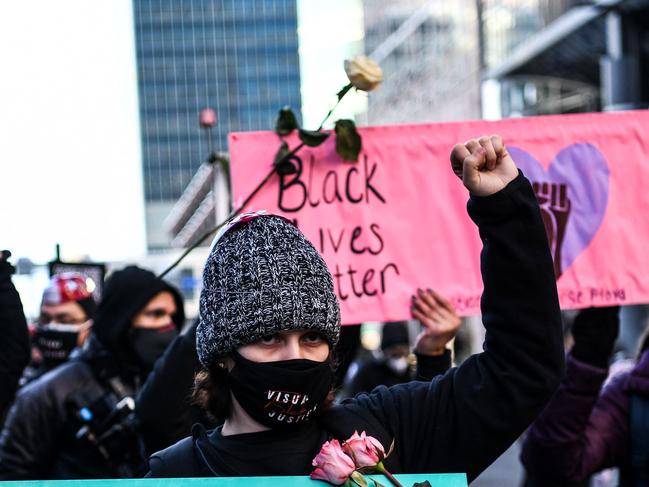 Demonstrators protest outside the Hennepin County Government Centre before jury selection begins. Picture: AFP