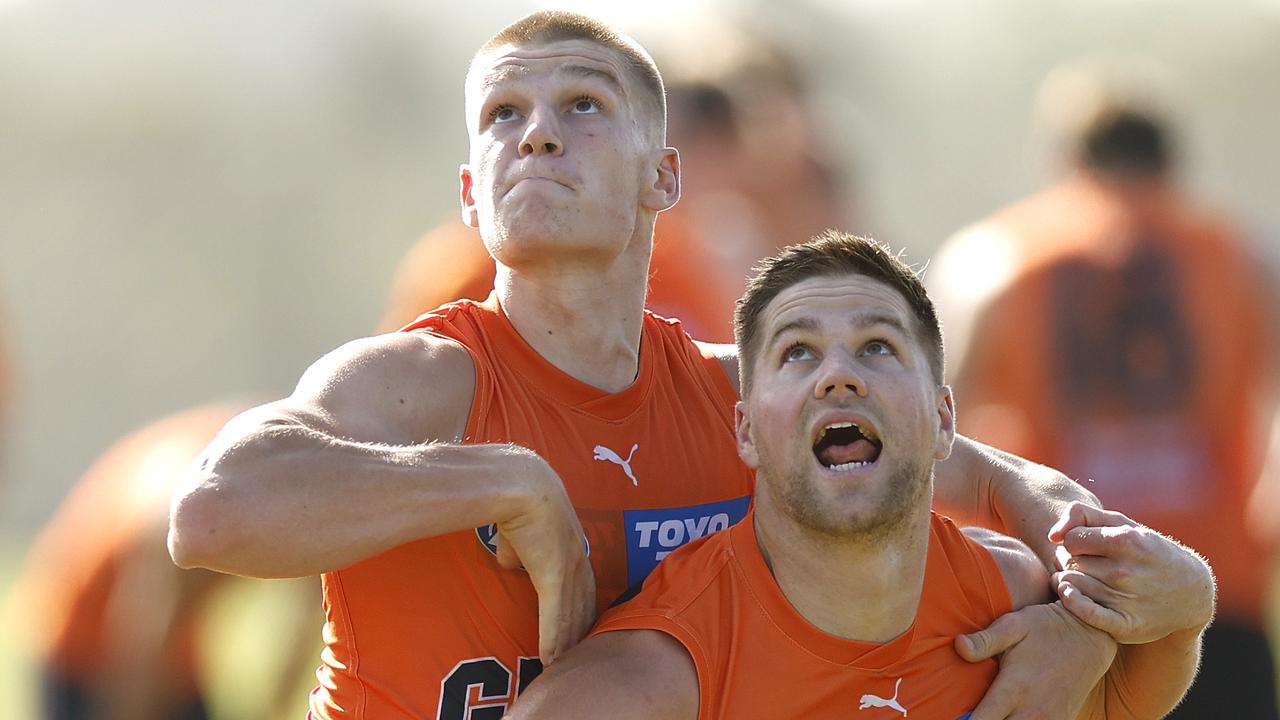 Harry Himmelberg and Max Gruzewski during a GWS Giants training session. Picture: Phil Hillyard