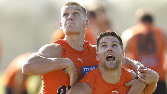 Harry Himmelberg and Max Gruzewski during a GWS Giants training session. Picture: Phil Hillyard