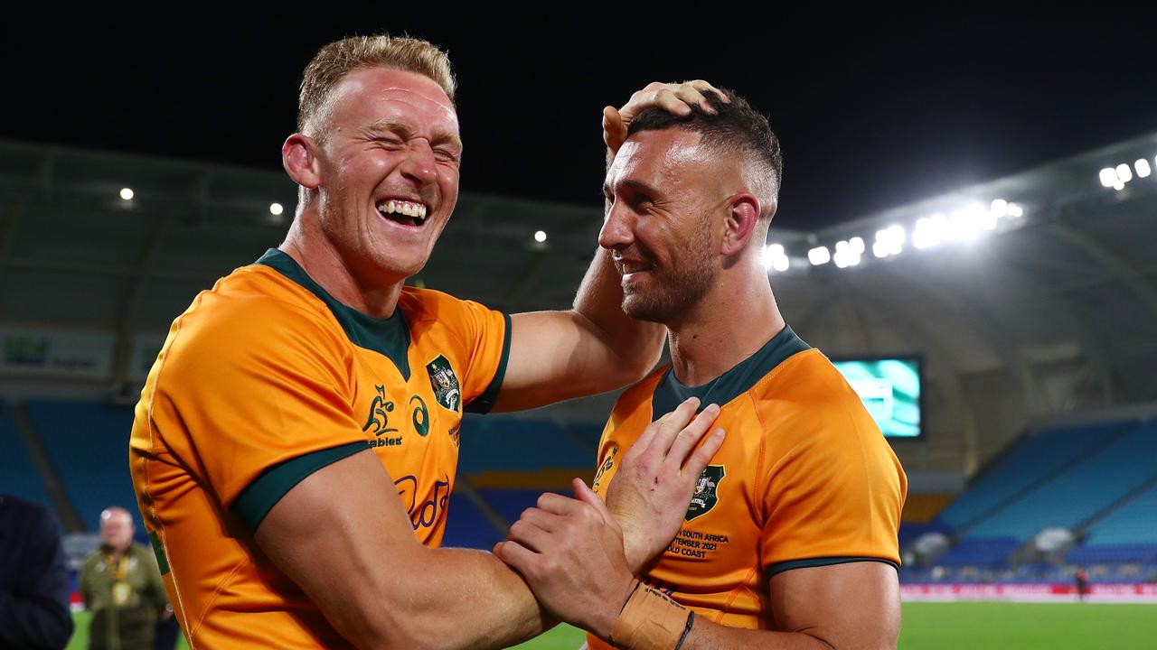Reece Hodge and Quade Cooper celebrate an incredible Wallabies win.