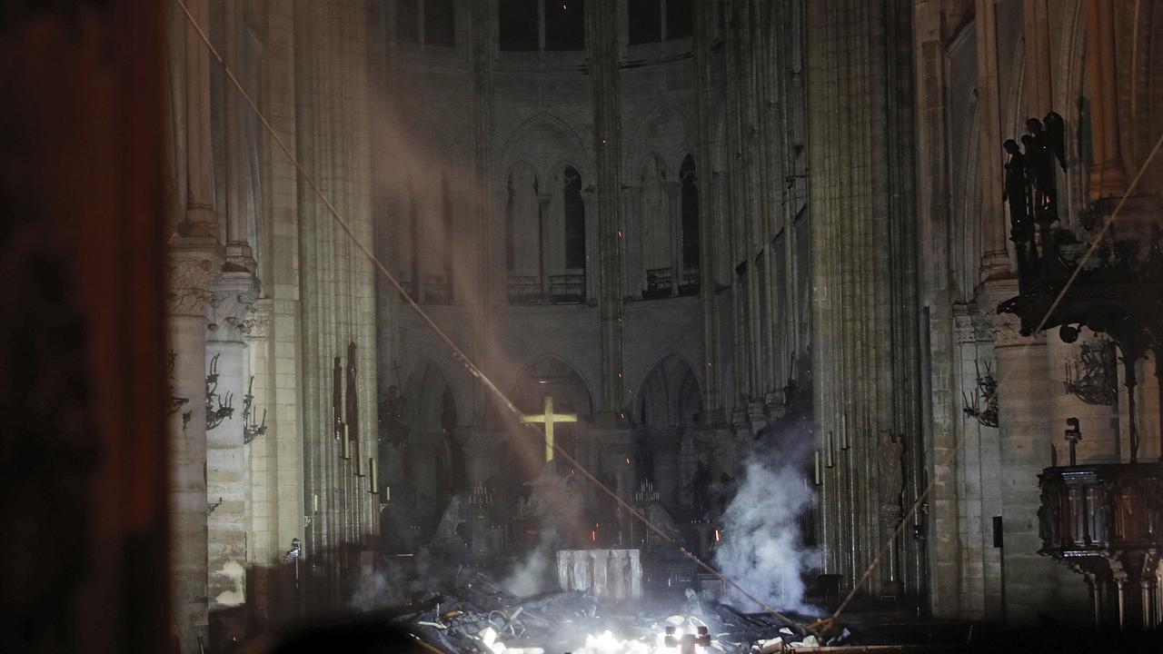 Smoke and devastation inside Notre Dame Cathedral in Paris. Picture: Philippe Wojazer