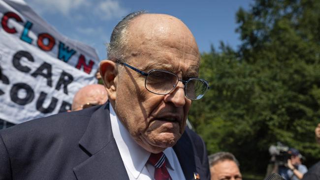 Rudy Giuliani, former New York City Mayor and attorney of Donald Trump, speaks to the media after being booked in Atlanta, Georgia. Picture: AFP