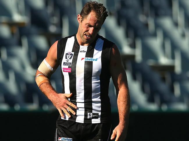 GEELONG, AUSTRALIA - MAY 14: Travis Cloke of Collingwood reacts after missing a shot at goal during the round six VFL match between Geelong and Collingwood on May 14, 2016 in Geelong, Australia. (Photo by Graham Denholm/Getty Images)