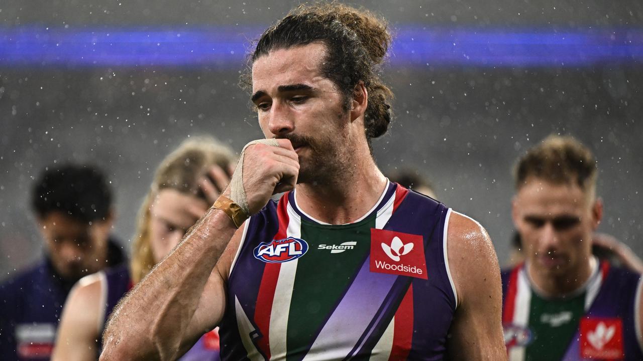 PERTH, AUSTRALIA - JULY 29: Alex Pearce of the Dockers looks dejected after a loss during the 2022 AFL Round 20 match between the Fremantle Dockers and the Melbourne Demons at Optus Stadium on July 29, 2022 in Perth, Australia. (Photo by Daniel Carson/AFL Photos via Getty Images)