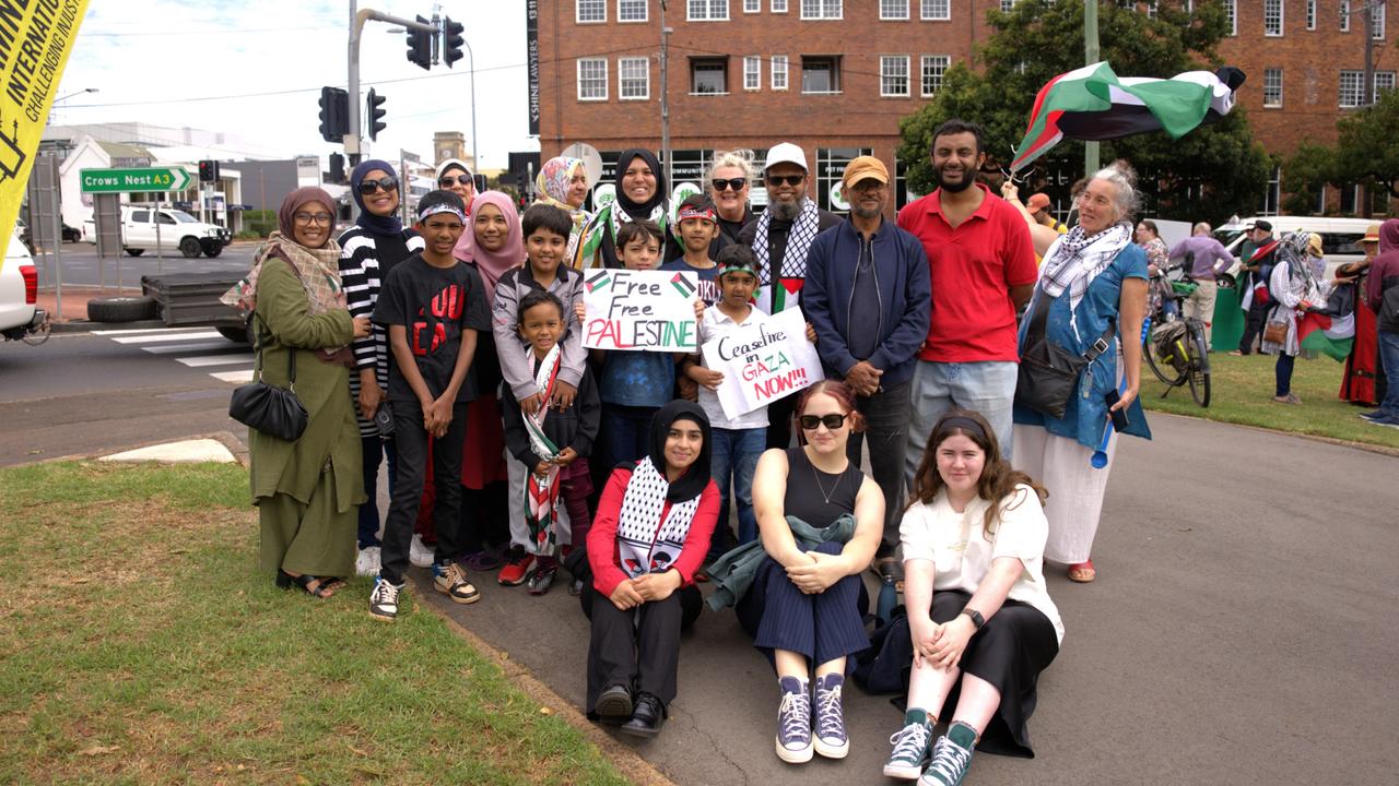 Adorned in red, white, green and black a group of around 80 people holding Palestinian signs and flags stood at the Hume and Margaret Street corner of Queen’s Park and showed their support for an immediate ceasefire in Gaza. Picture: Christine Schindler