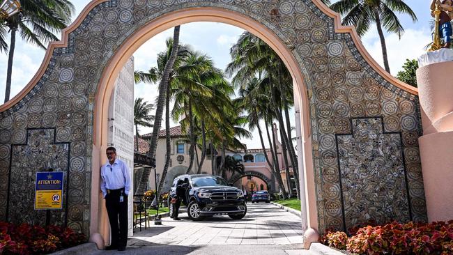 Security agents stand guard inside the Mar-a-Lago estate of former US President Donald Trump in Palm Beach, Florida. Picture: AFP