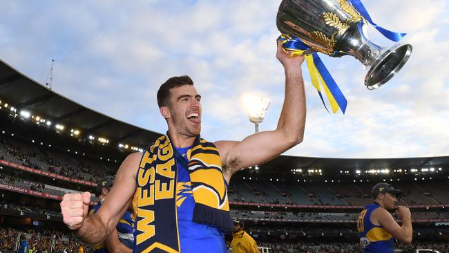 Scott Lycett holds up this year’s premiership cup. Picture: Julian Smith/AAP