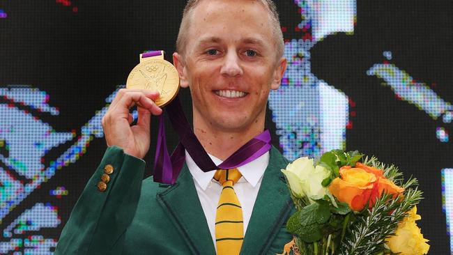 Jared Tallent after being awarded his gold medal last month for the 50km walk from the 2012 Olympic Games following the disqualification of Russian walker Sergey Kirdyapkin for doping.