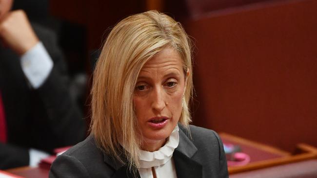 **FILE** A September 4, 2017 file photo of Labor Senator Katy Gallagher in the Senate chamber at Parliament House in Canberra. Labor frontbencher Katy Gallagher could be referred to the High Court after revealing British authorities did not confirm renunciation of her UK ties until two months after nominations closed for the 2016 election. (AAP Image/Mick Tsikas) NO ARCHIVING