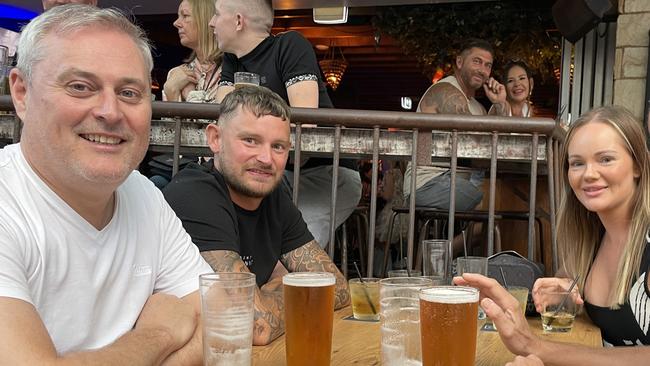 Lyndon Middwood, Matthew Harris and Tahnee Sumner enjoying a drink in Surfers Paradise.