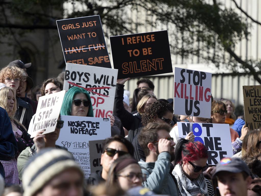 Thousands gather outside the State Library for the national rally against gender based violence. Picture: Andrew Henshaw