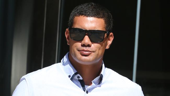 Thomas Barlett leaves the Southport Magistrates court after being charged with animal cruelty for throwing a cattle dog puppy into a car, Southport, Gold Coast. Photo: Regi Varghese