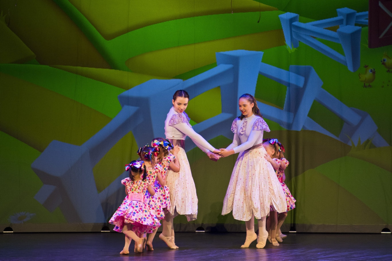 Grace Byrne (left) and Ella Everest guide the younger dances in Once Upon a Time presented by Dance Central junior school at Empire Theatres, Saturday, November 9, 2019. Picture: Kevin Farmer