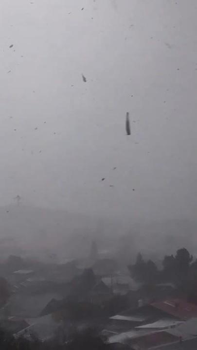 Debris Fly as Tornado Rips Through Southern Chile