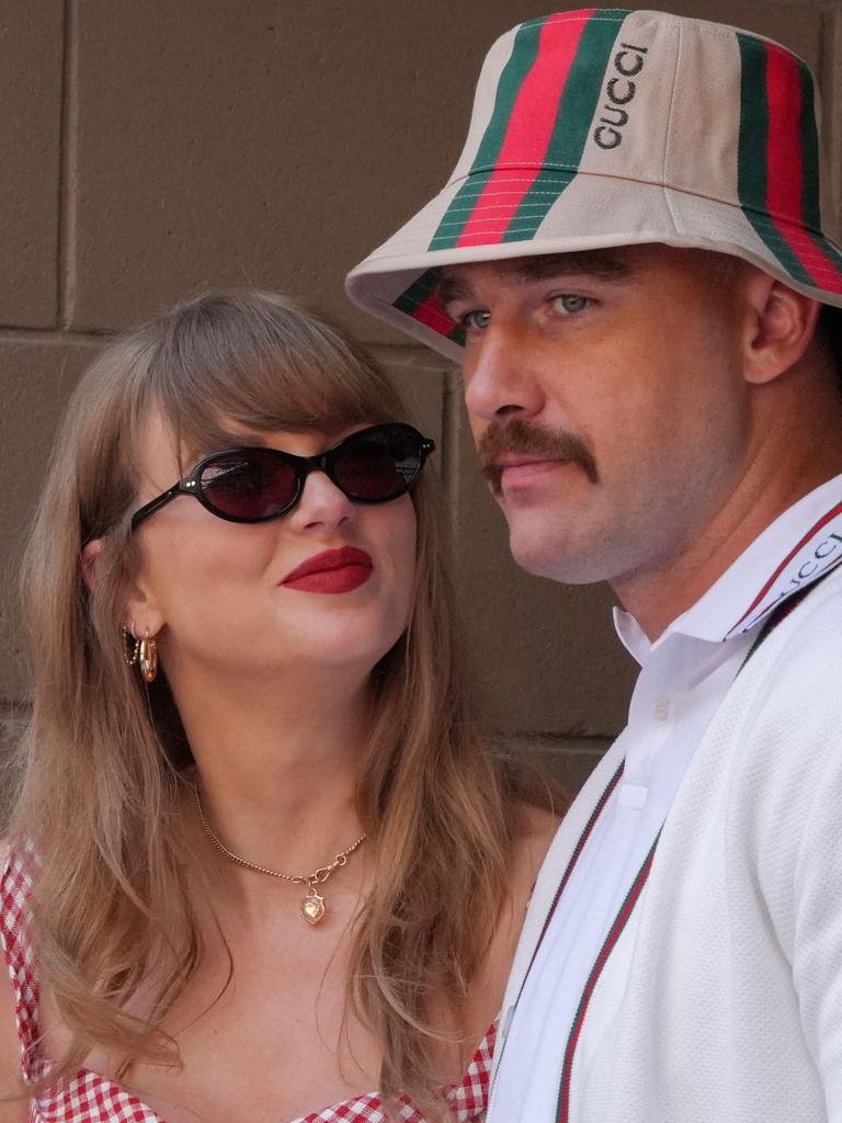 The loved up couple at the US Open. (Photo by TIMOTHY A. CLARY / AFP)