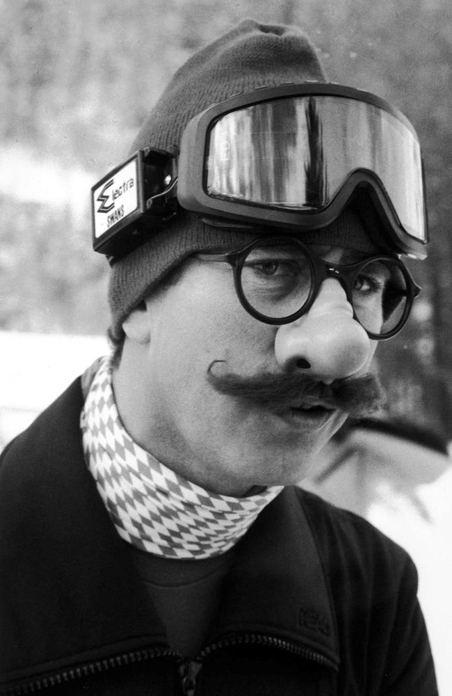 Prince of Wales donned a false nose and glasses and joked around with photographers as he leaves the chalet in Klosters, Switzerland. Picture: Arthur Edwards